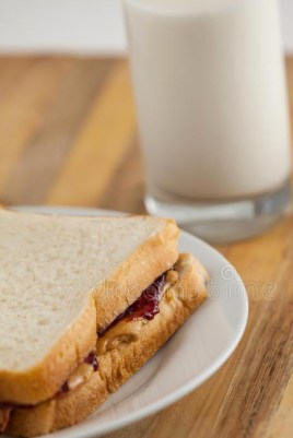 peanut-butter-jam-sandwich-plate-jelly-glass-milk-84091116